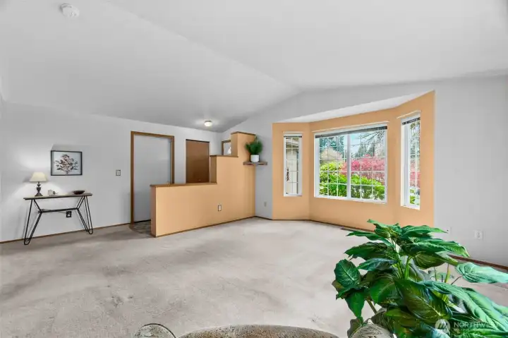 Another view of living room and entry