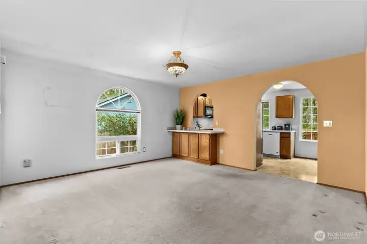 Dining room with small counter and storage and pass through to kitchen.  Great for entertaining.