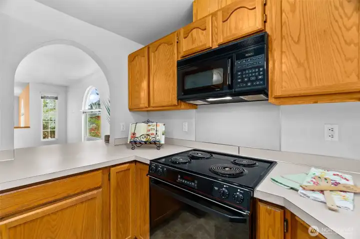 View from kitchen to dining room via pass through.
