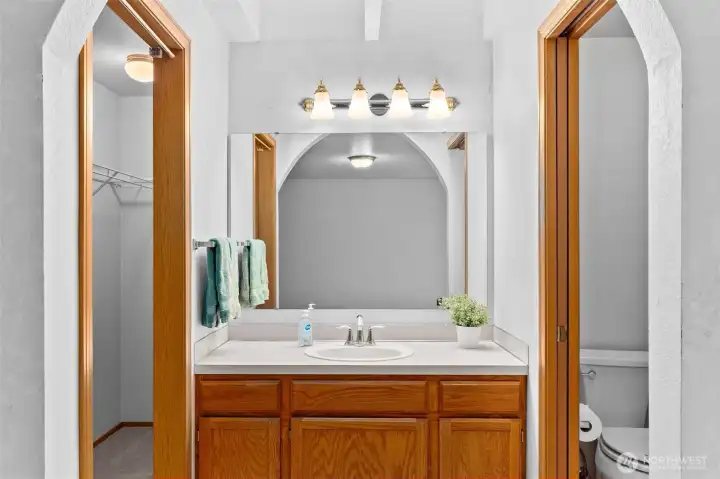 Primary on-suite bath with skylights for extra light.