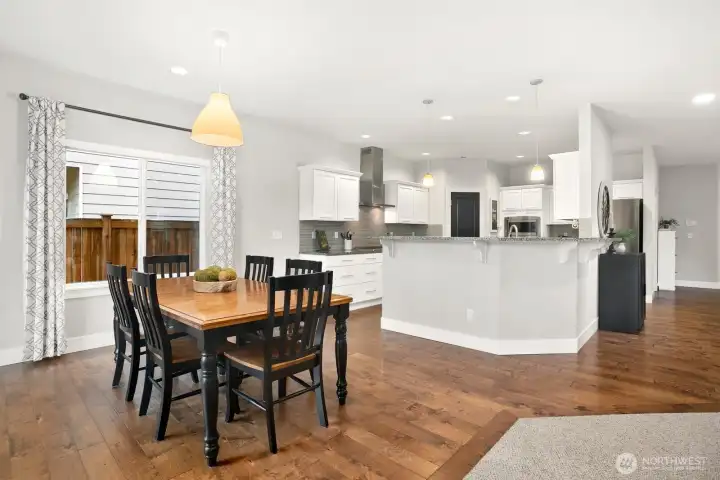 Dining space off the kitchen as well as bar-top seating