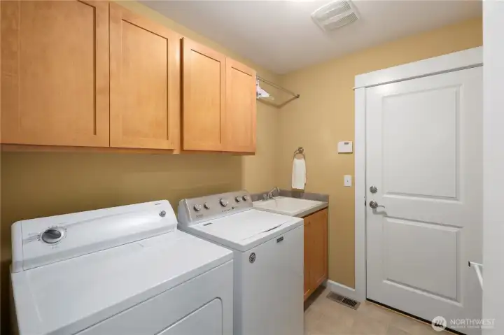 Laundry room that enters 2 car garage