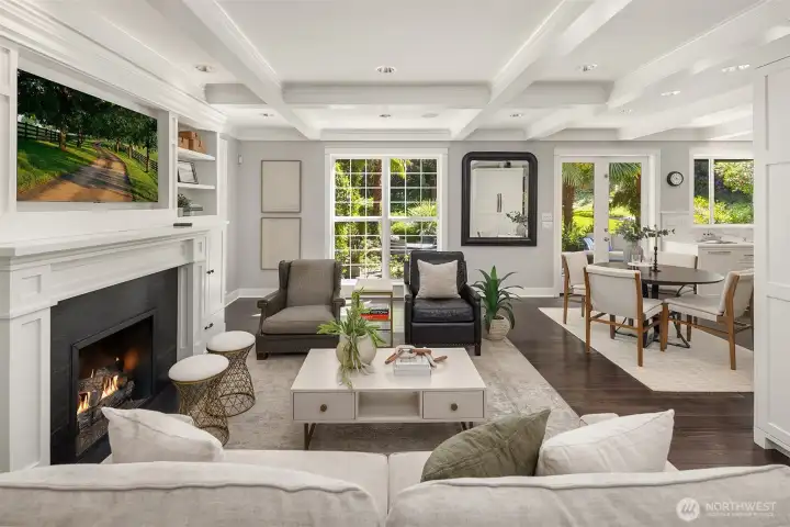 The main level features an elegant dining room, handsome office with custom built-ins and a light-filled great room that opens seamlessly to the outdoors. The main level features an elegant dining room, handsome office with custom built-ins and a light-filled great room that opens seamlessly to the outdoors.