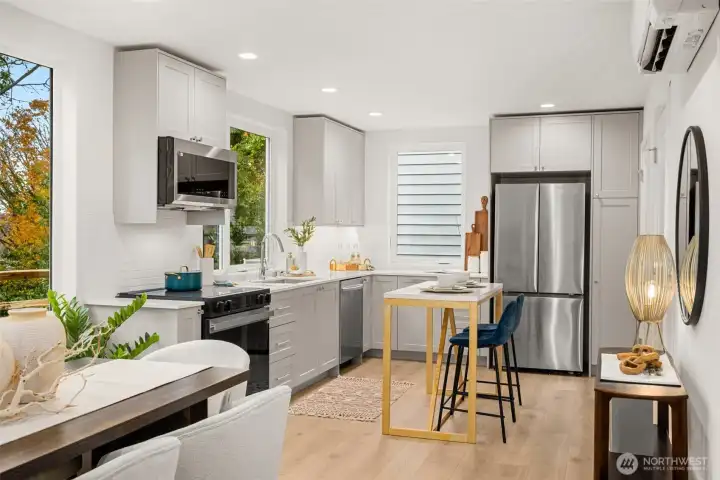 The kitchen features all luxury options. Thick, durable, quartz countertops, fullsized stainless steel appliances, and undermount sink