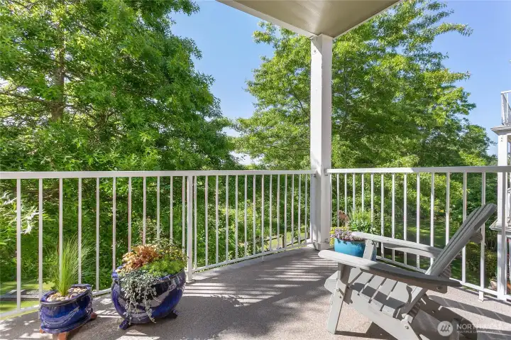The back covered patio is splendid.  The greenbelt and pond lend to peace and quiet.