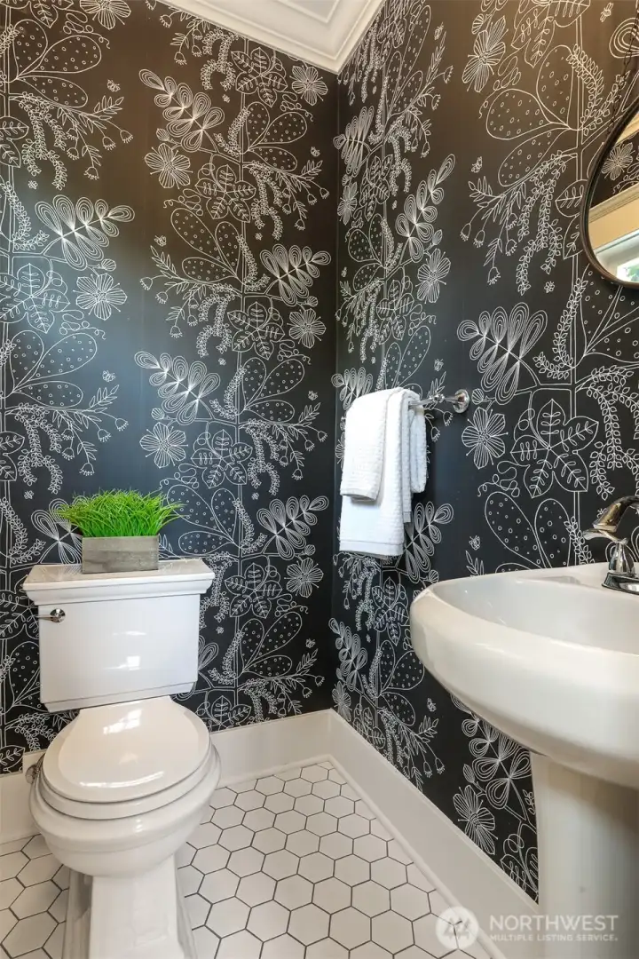 Powder room adjacent to the den & kitchen.