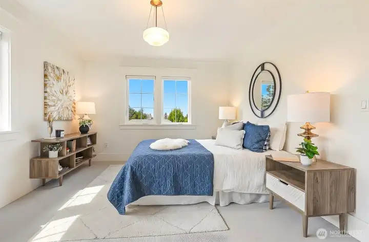 One of 2 bedrooms on this level. This one has its own 1/2 bath.