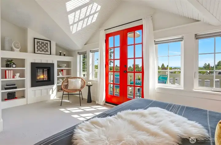 Vaulted ceilings, gas fireplave, built-ins & French doors to the view deck!
