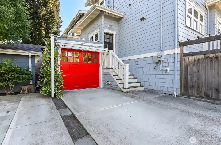 Attached garage with ample driveway parking.