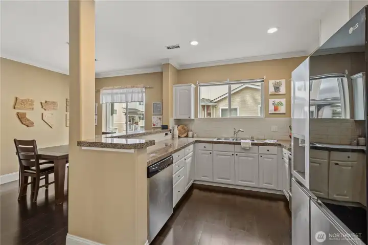 Kitchen with newer appliances and ample counter space Kitchen with newer appliances and ample counter space