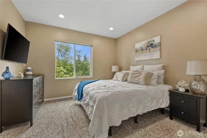 Primary suite with walk in closet and primary en-suite bath Primary suite with walk in closet and primary en-suite bath
