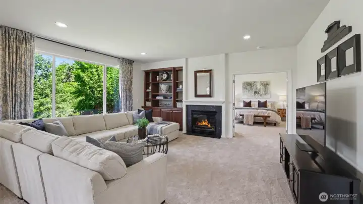 Built-ins and a tile surround gas fireplace enhance this casual living space. New carpet throughout! Built-ins and a tile surround gas fireplace enhance this casual living space. New carpet throughout!