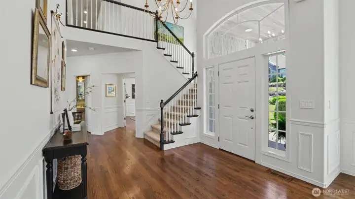 A kaleidoscope of sunlit windows surrounds the grand 2-story entry A kaleidoscope of sunlit windows surrounds the grand 2-story entry