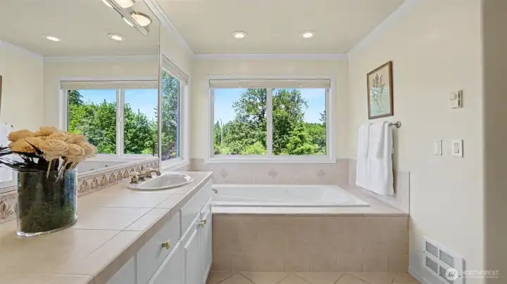 Relax away the stresses of the day in the jetted soaking tub Relax away the stresses of the day in the jetted soaking tub