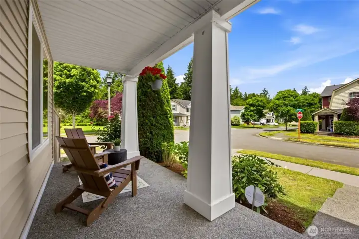 Step outside the front door to enjoy the neighborhood from the front porch