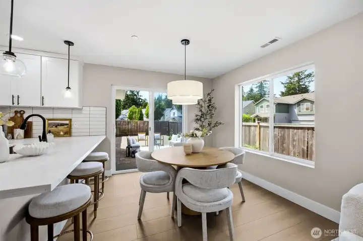 Dining area with views of the fenced patio.
