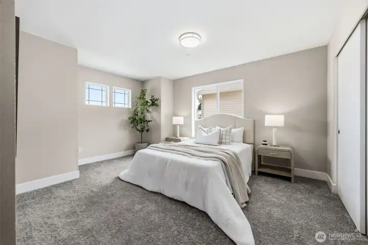 Second floor bedroom for guests or family.