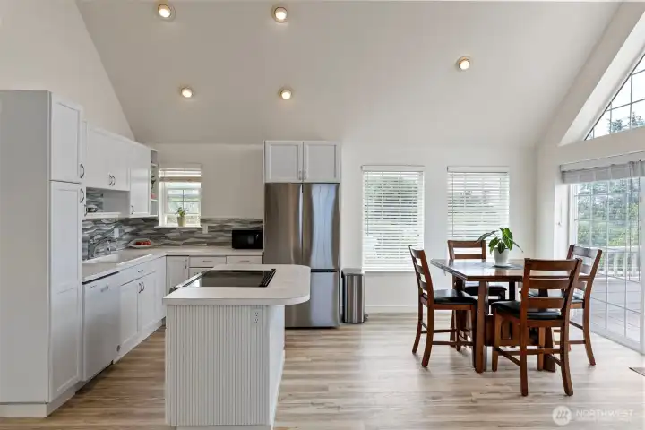 Beautifully appointed kitchen with new SS stove and refrigerator.