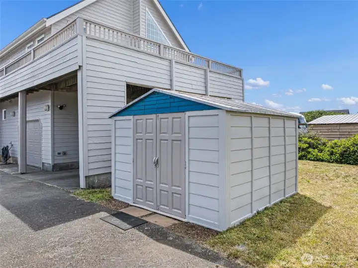 Freshly painted outbuilding with lots of storage.