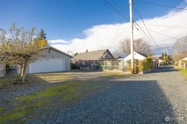 Looking at the rear of the garage and driveway.