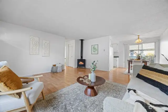 Looking toward the dining area from the living room where you can feel the openness.