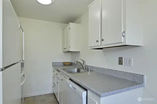 Bright kitchen with new vinyl flooring