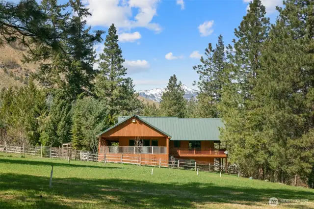 View of back of home with master and deck