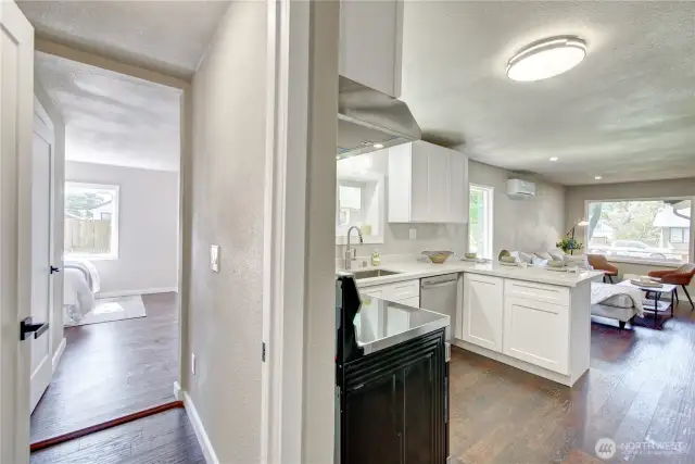 Kitchen view to the left entrance to Primary