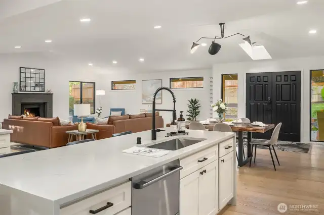 Updated, bright kitchen with oversized island for entertaining or eating.