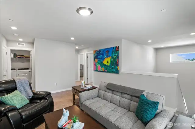 Spacious upper Loft is a great media room, office or playroom!