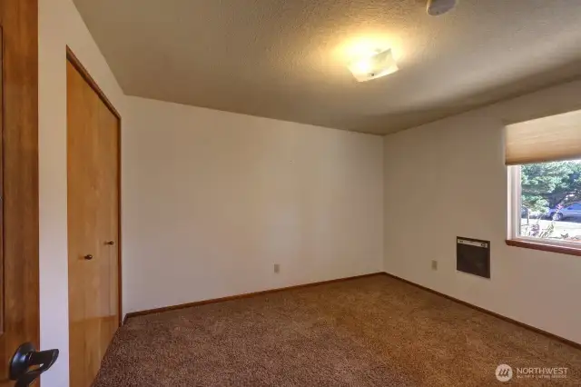 Primary Bedroom with walk in closet and full bathroom.