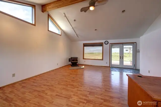 Currently an office, but could be a media room, family room extra gathering place. Complete with a pellet stove and access to the ocean front deck
