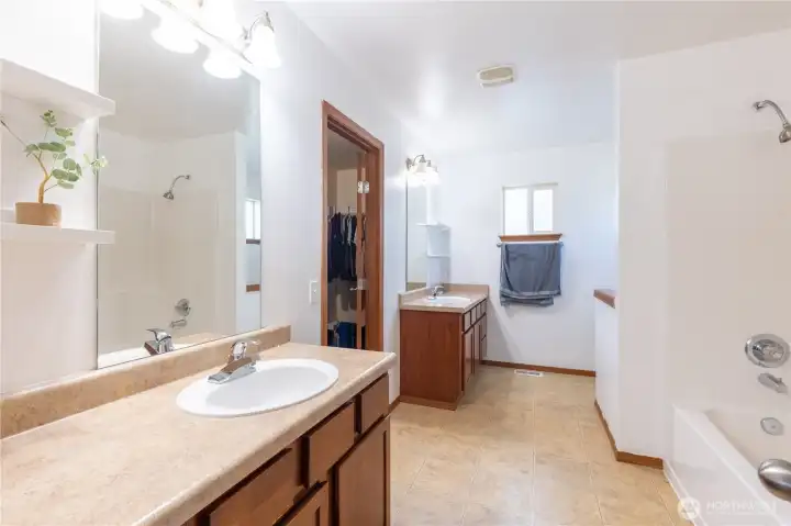 Spacious Primary Bath with separate vanities.