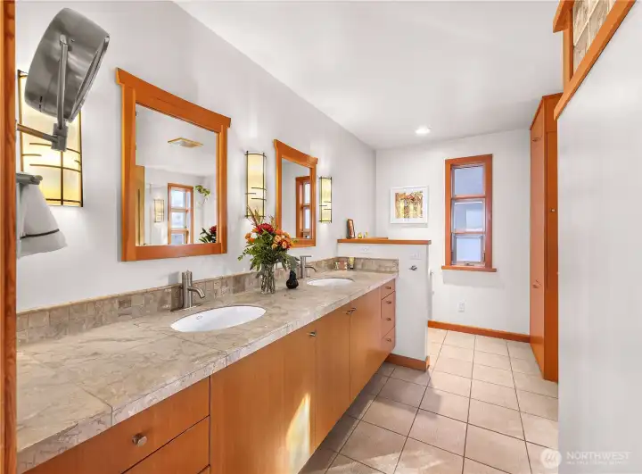 Large bright ensuite located in primary. Dual vanity and lots of storage.