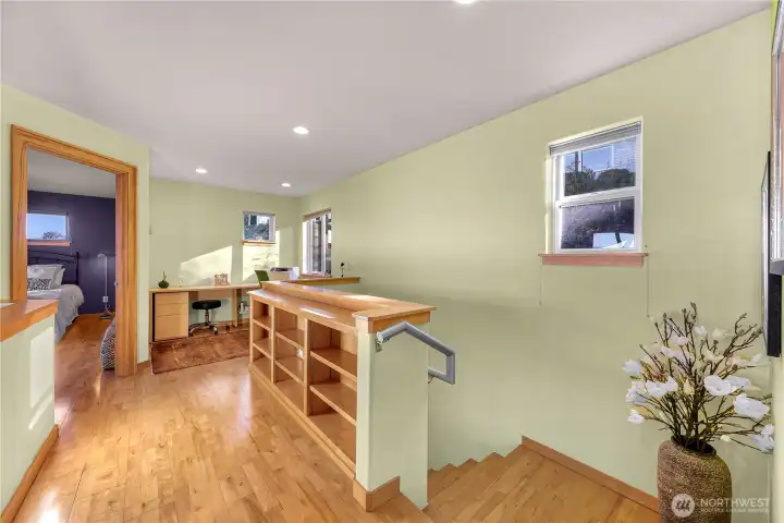 Upstairs holds 2 bedrooms a second full bath and office space. Filled with bright natural light from the 20 foot ceilings surrounding!