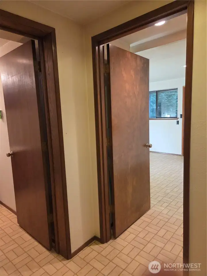 Lower level bedroom #2 on the right, bathroom on the left.