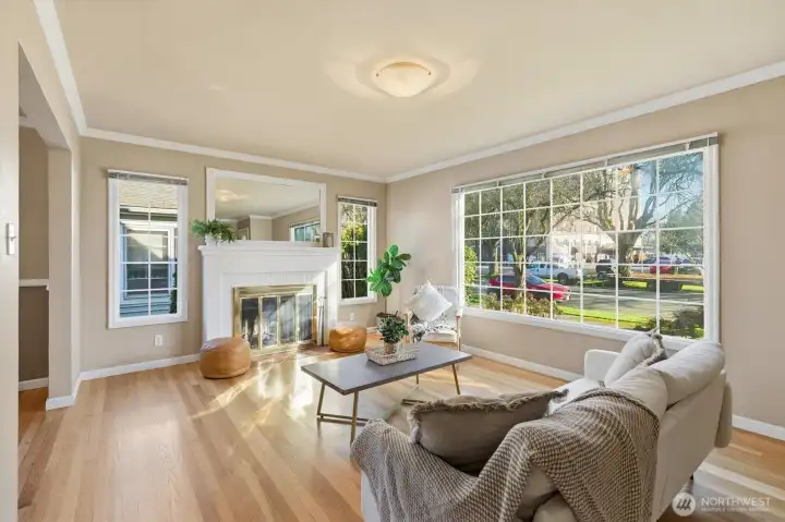 Main Floor Living Room with Hardwood and Fireplace