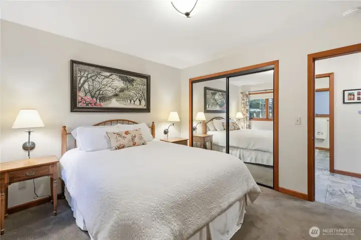 Another view of the main floor bedroom off the main hallway. Note the ample closet space.