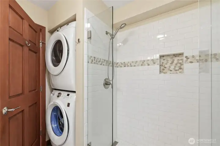 The washer and dryer are conveniently located in the main floor bathroom.