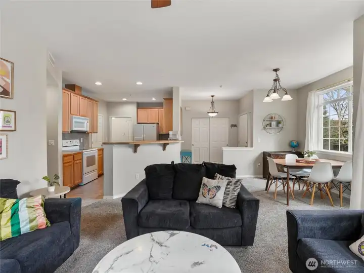 Wonderful floorplan is open to the kitchen and dining area.