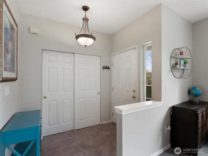 A large entry closet provides tons of storage.