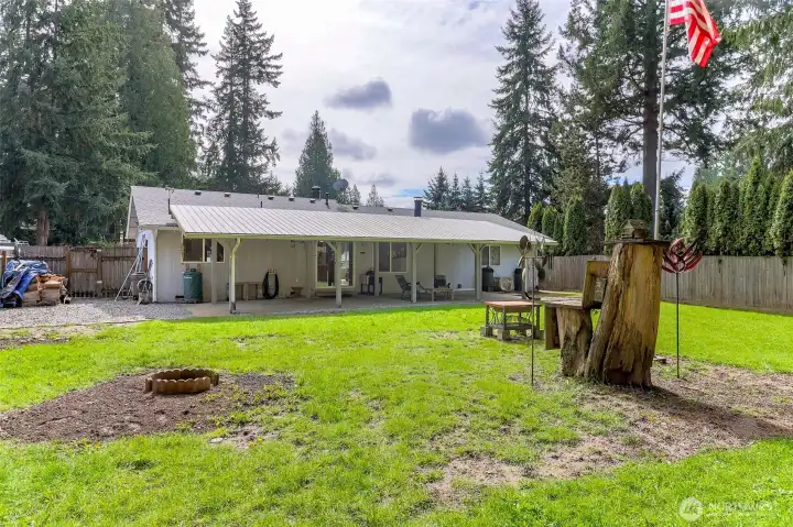 More photos of the backyard and firepit.