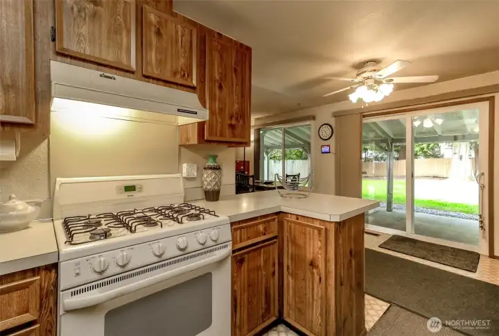 Kitchen with gas cooking.