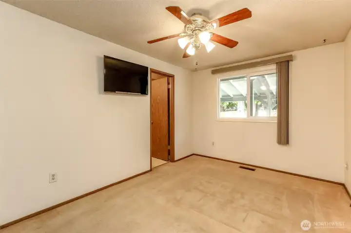 Primary bedroom with en suite bathroom.