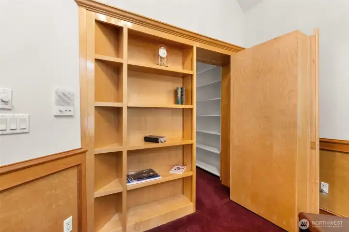 Built-in cabinets with secret storage room.