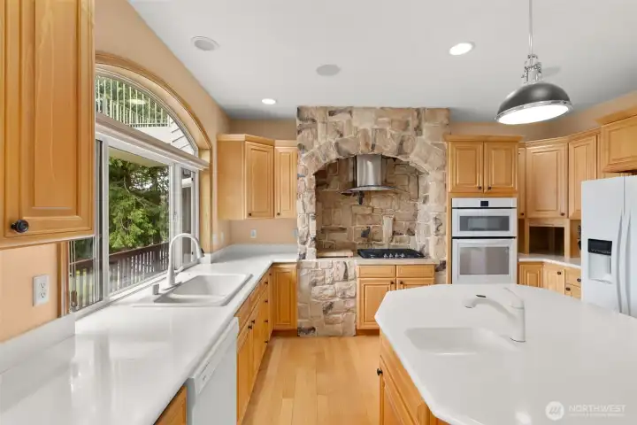 Large Kitchen with gas stove.