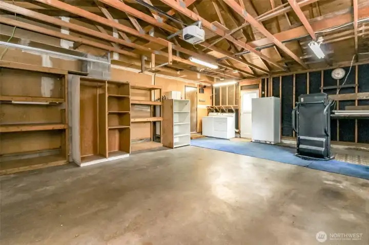 Double car garage with tons of shelving Double car garage with tons of shelving