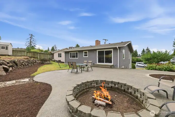 Expansive, sun-filled yard ideal for play. and entertaining