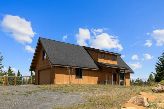 Set atop the highest point of the acreage with views in all directions.