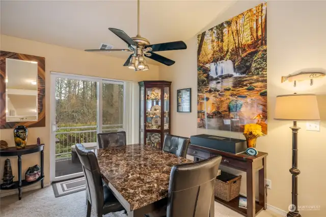 Dining area off large kitchen leads to the patio doors.